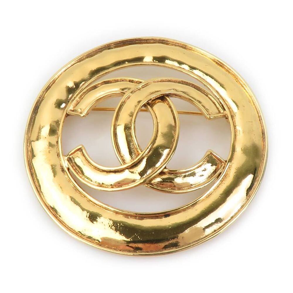 CHANEL Gold Logo Brooch